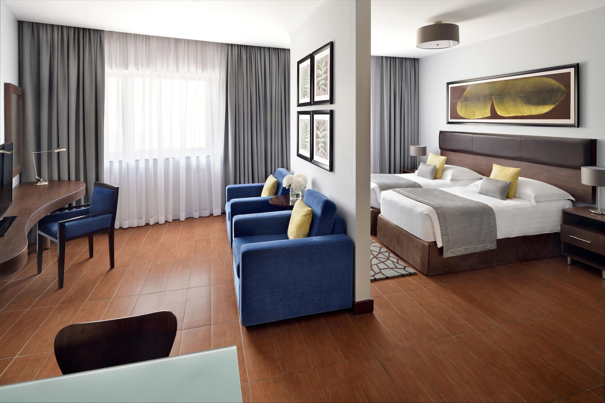 Moevenpick Hotel Apartments Al Mamzar Dubai Esterno foto