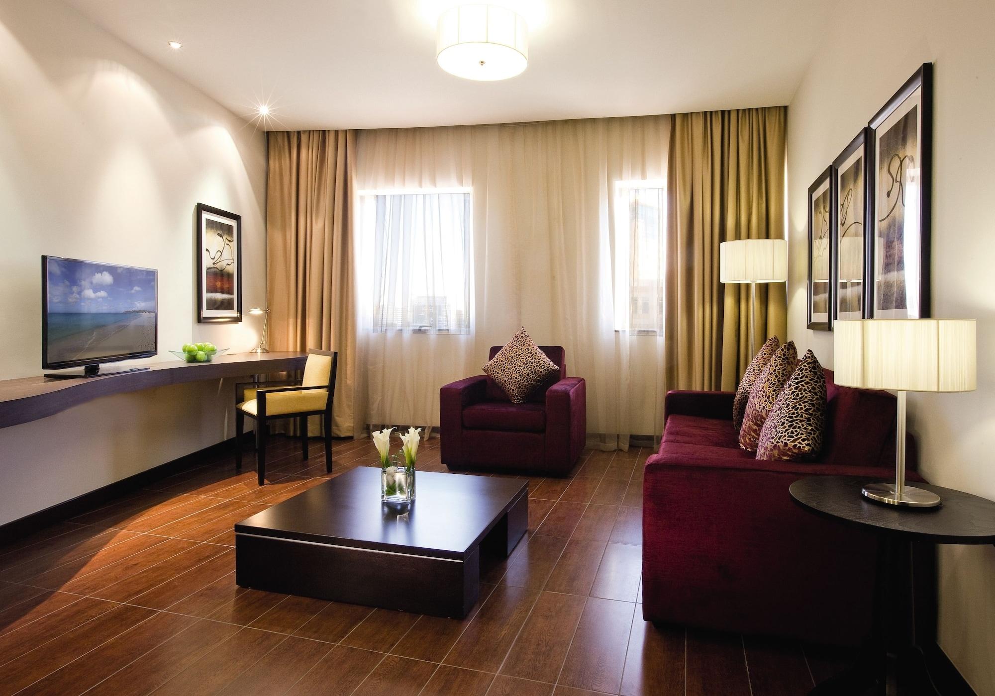 Moevenpick Hotel Apartments Al Mamzar Dubai Esterno foto Living room