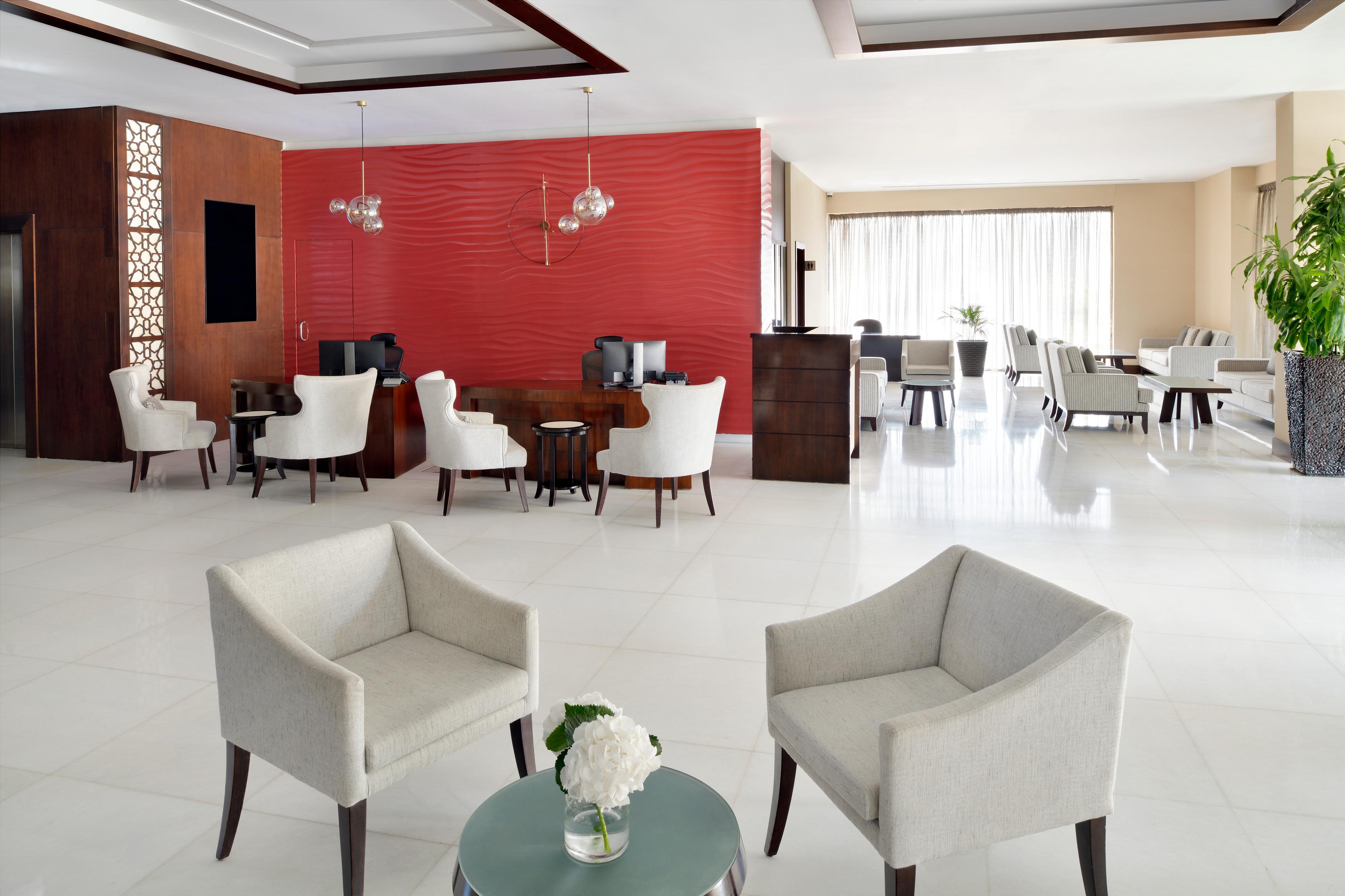 Moevenpick Hotel Apartments Al Mamzar Dubai Esterno foto Lobby