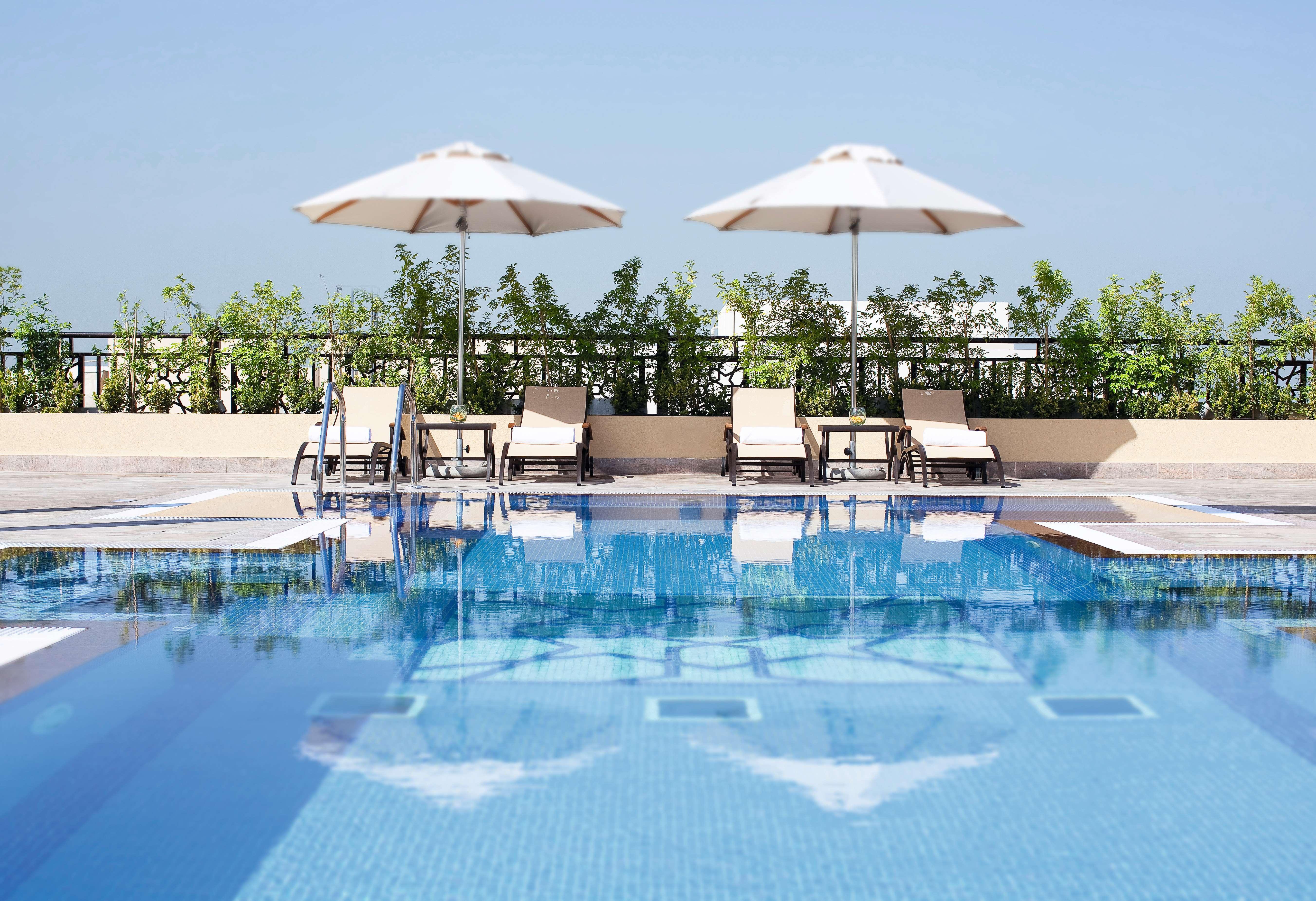 Moevenpick Hotel Apartments Al Mamzar Dubai Esterno foto Rooftop pool